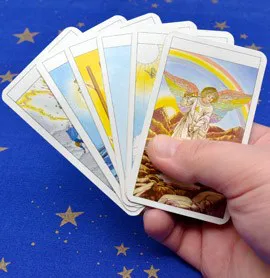 Hand holding taroth cards